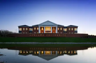 Dwight Schar College of Nursing building at night