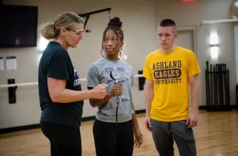 professor instructing student