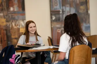 Students sitting and talking in the Student Center