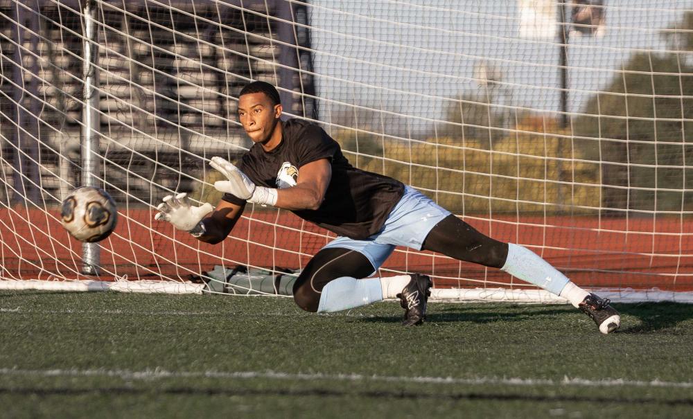 AU soccer goalie catching ball