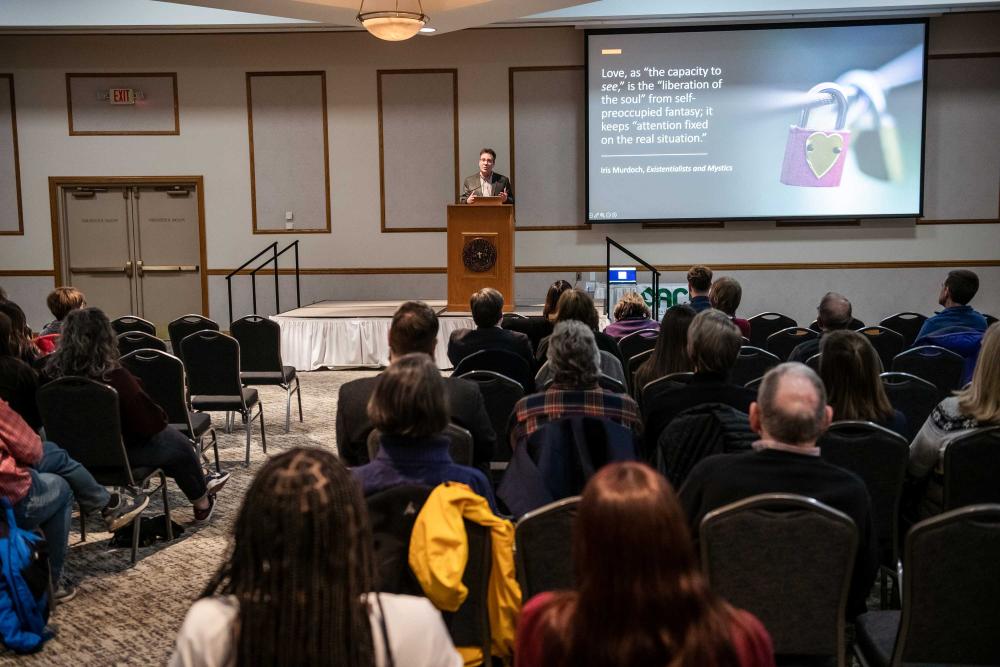 Matthew Lee speaking at 2025 ACN Conference