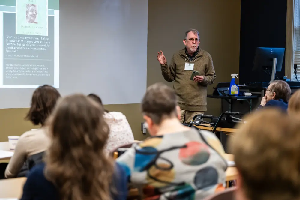 person lecturing at a conference