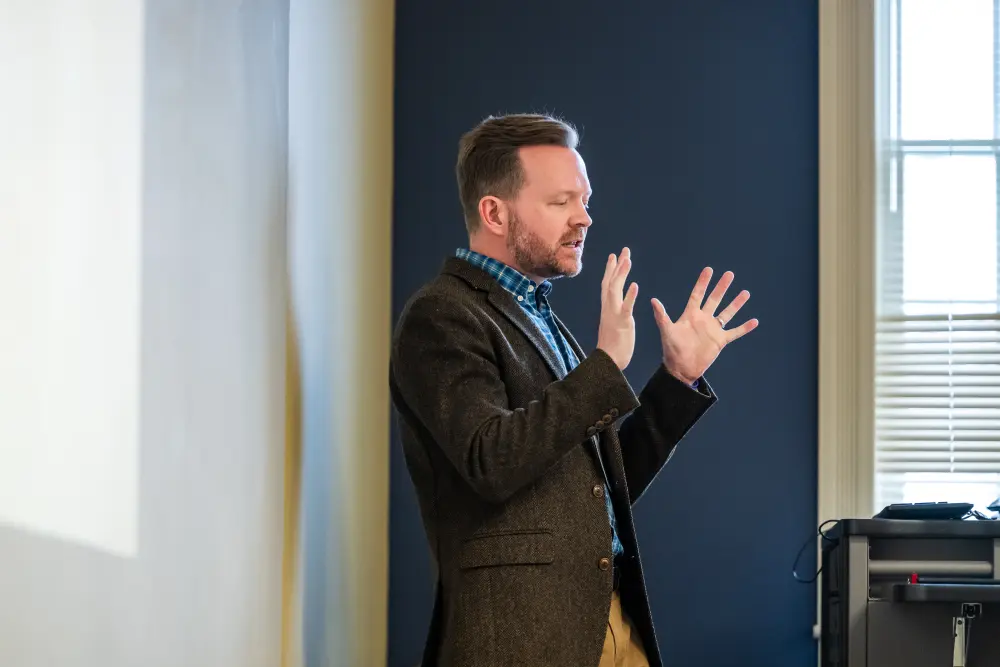 person lecturing at a conference