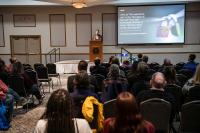 Matthew Lee speaking at 2025 ACN Conference