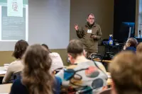 person lecturing at a conference