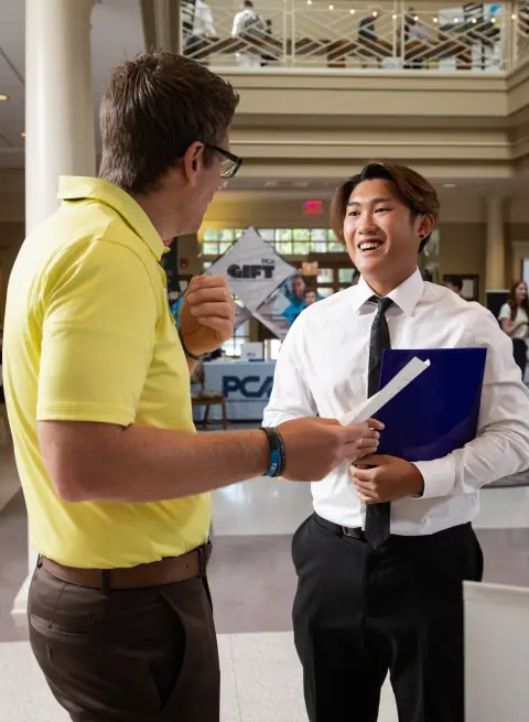 potential employer and student talking