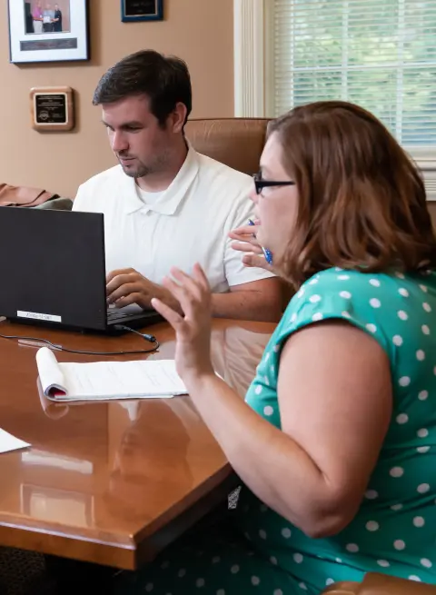 people communicating in a meeting