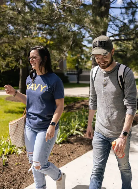 students walking across campus