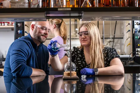 Melanie Eichler, winner of 2025-26 Goldwater Scholarship, poses in Nick Johnson's lab.