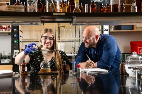 Melanie Eichler, winner of 2025-26 Goldwater Scholarship, poses in Nick Johnson's lab.