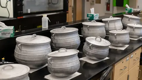 Examples of the aluminum cookware Jeff Weidenhamer and AU students have been conducting research on.