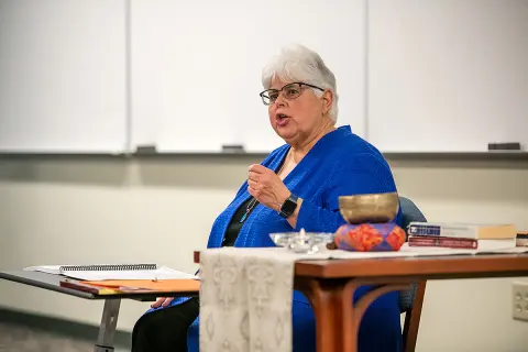 Evangeline Andarsio, M.D., leads a Healer's Art Course workshop in March 2025