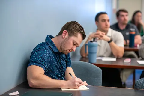 A physician assistant student during a Healer's Art Course workshop in March 2025.