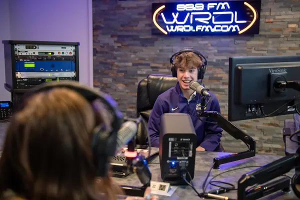 students on air at WRDL radio station