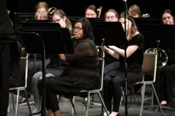 students playing in band concert