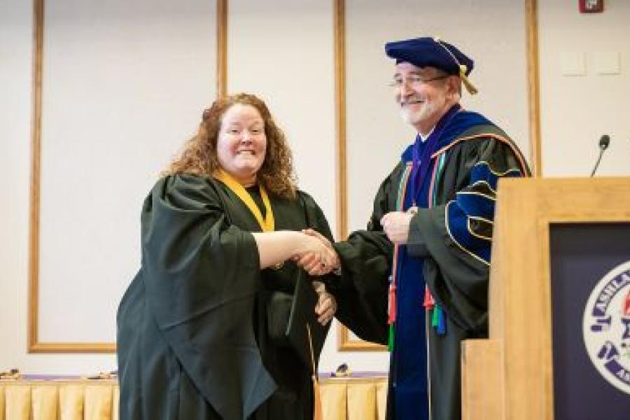 Student receiving award at Academic Honors Convocation