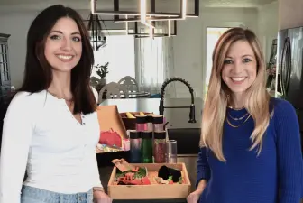 Devin Pirko and Ashley Gibbs with one of their sensory play kits