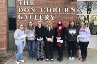 2022 Art Award Winners standing in front of Coburn Gallery