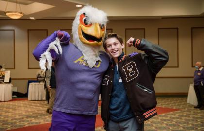 Eagle mascot with student 