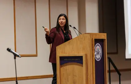 Jillian Peterson speaking at Symposium Against Indifference