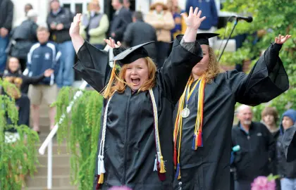 Student celebrating after commencement