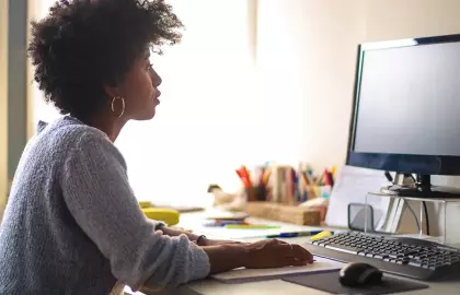 Woman working at a computer