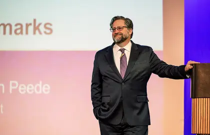 President Jon Parrish Peede presenting at 2025 All-Institutional Meeting