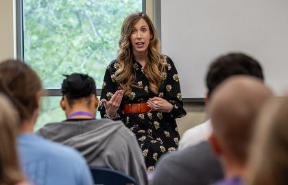 Cara Rogers Stevens speaking to a class