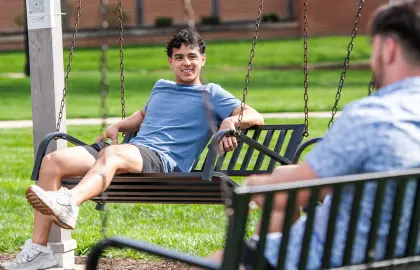 students on swings