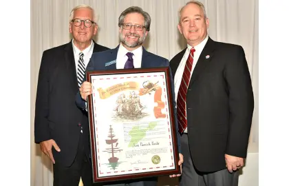 President Peede poses with his Ohio Commodores award