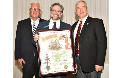 President Peede poses with his Ohio Commodores award
