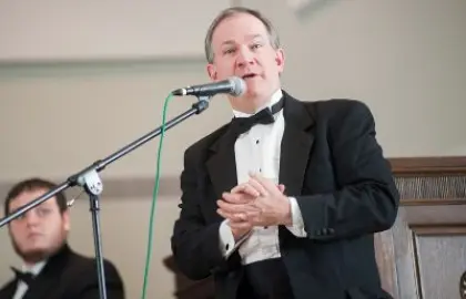 Dr. Ron Blackley speaking during choir concert