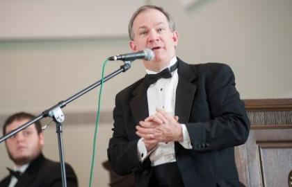 Dr. Ron Blackley speaking during choir concert