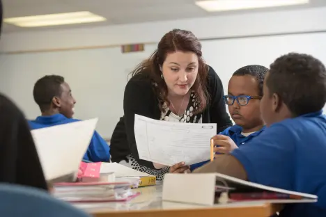 Student teacher working with students