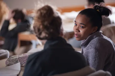 Students in Philosophy class talking to each other