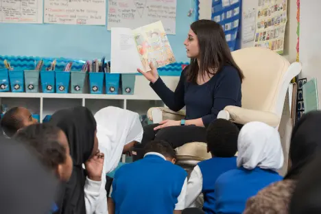 TESOL teacher reading to class