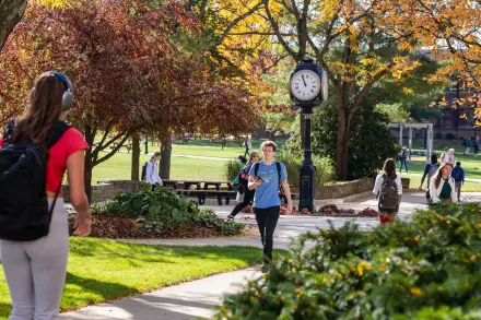 students walking across campus