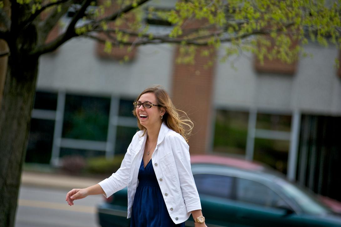 Female student walking along Claremont Avenue