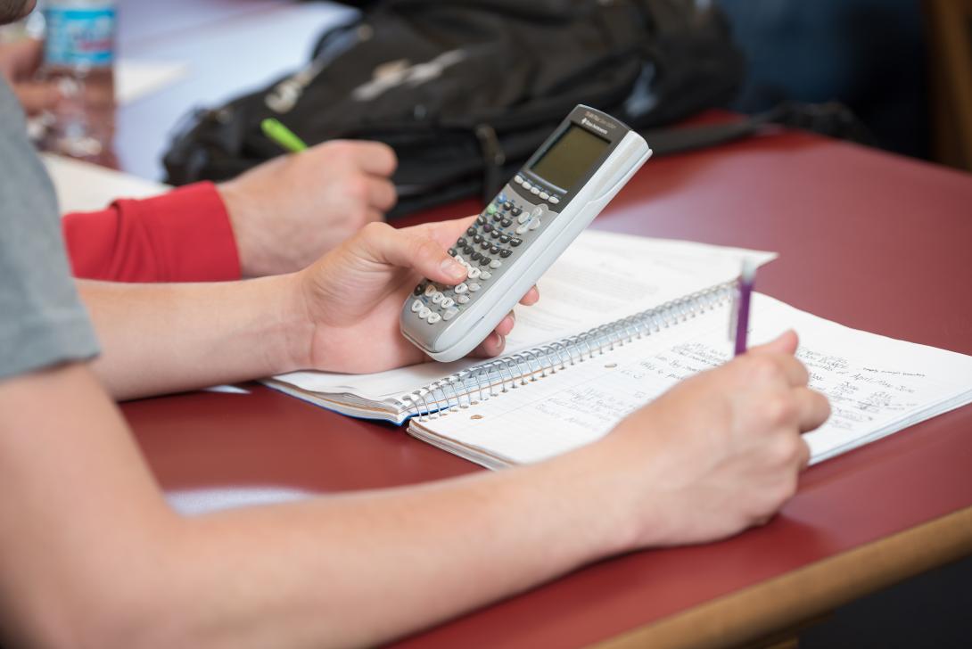 Student using a calculator