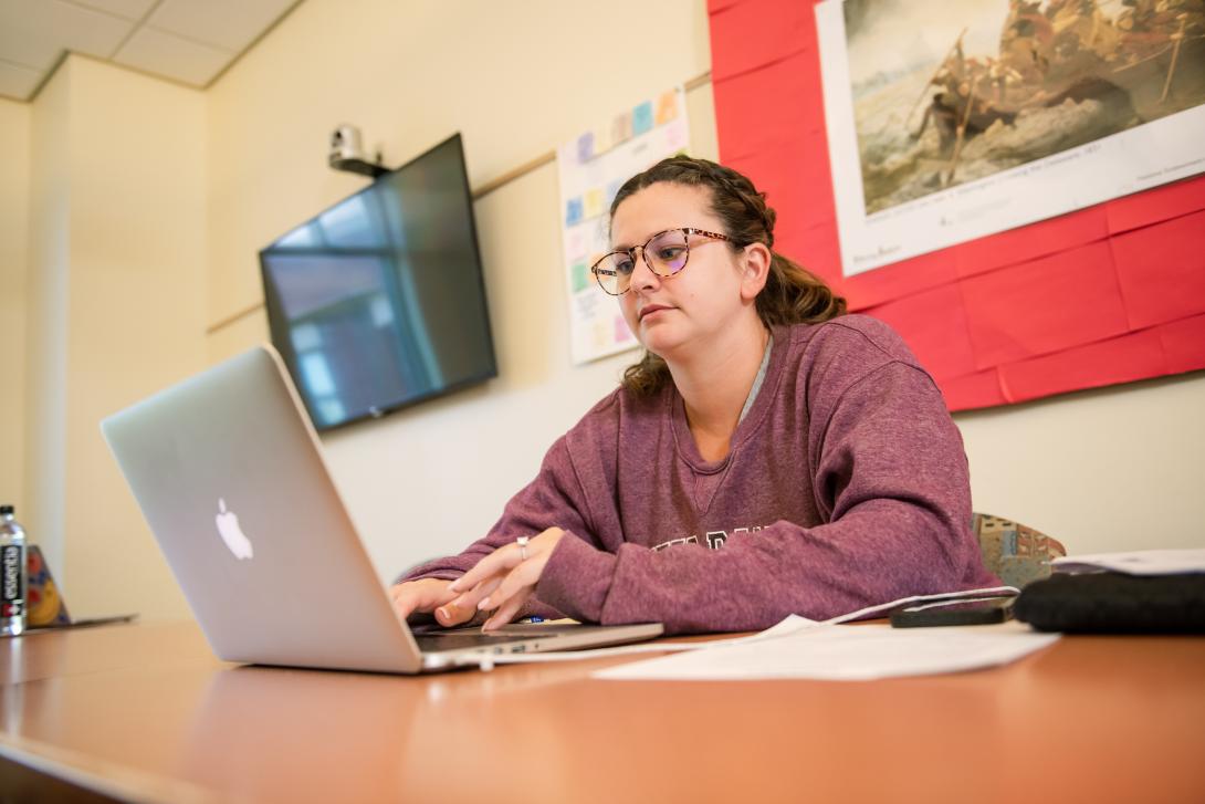 Principal licensure student on her computer