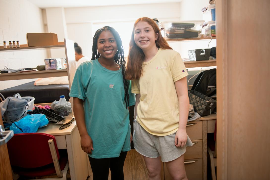 Students in their dorm at moving