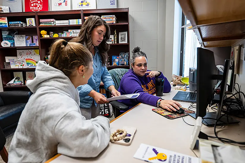 Professional advisor Kelly Kossick works with a student