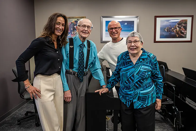 Annette Hruby, Ron Sprunger, Ron and Linda's son, and Linda Sprunger at the Sprunger Piano Lab dedication