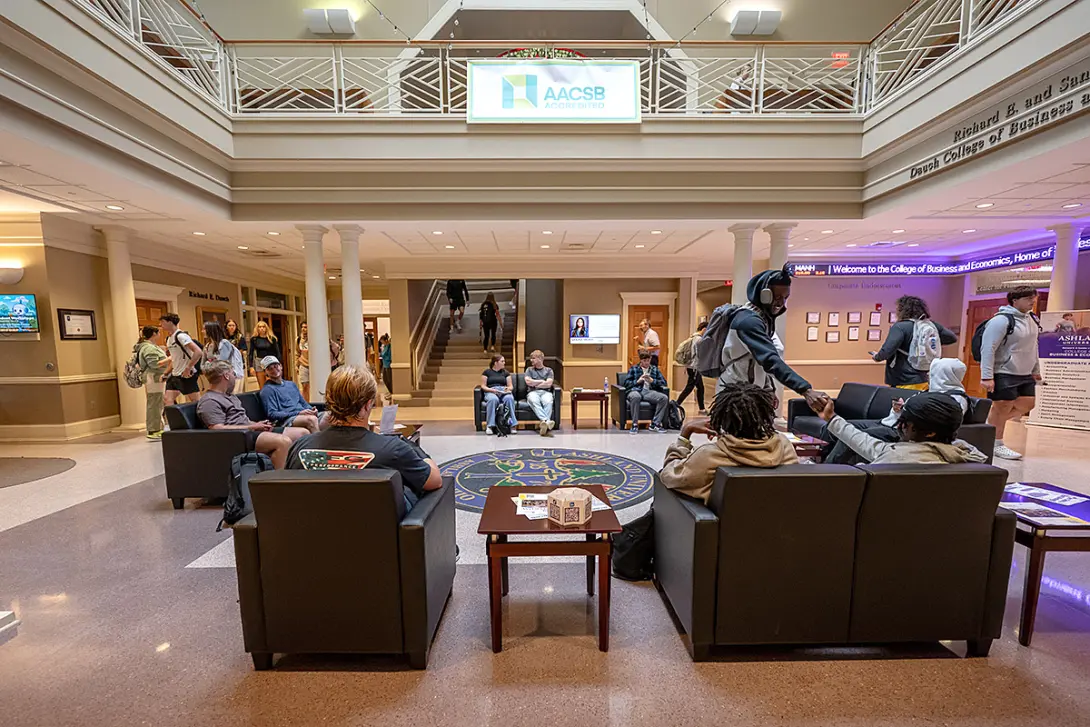 group of students on first floor of College of Business and Economics
