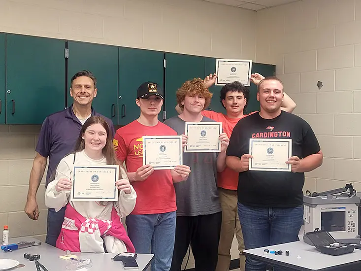 Students from Cardington-Lincoln and Northmor school districts display their certificates having completed the OpTIC fiber splicer training