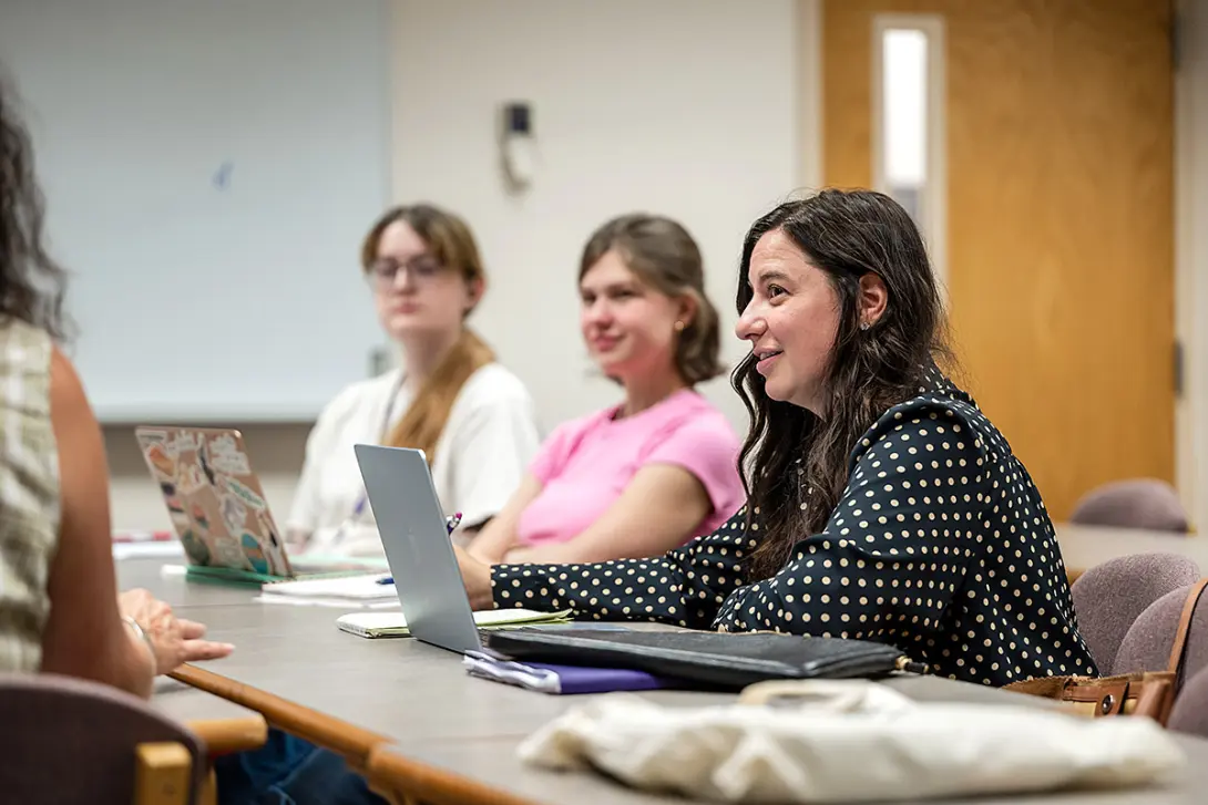 Emma Fulenwider, a student in the 2026 MFA in Creative Writing program, participates in a class discussion